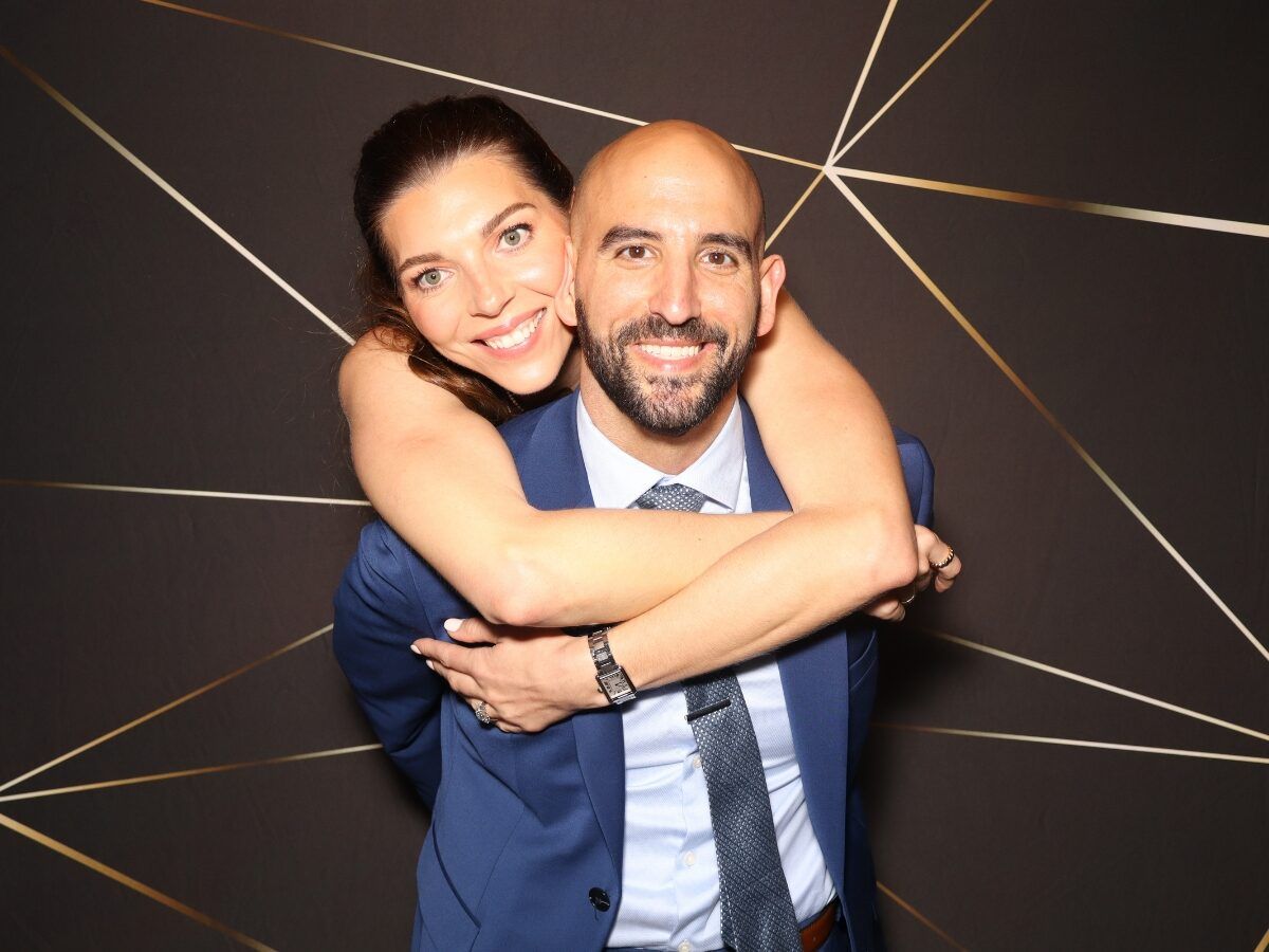 Couple striking a pose in the photo booth