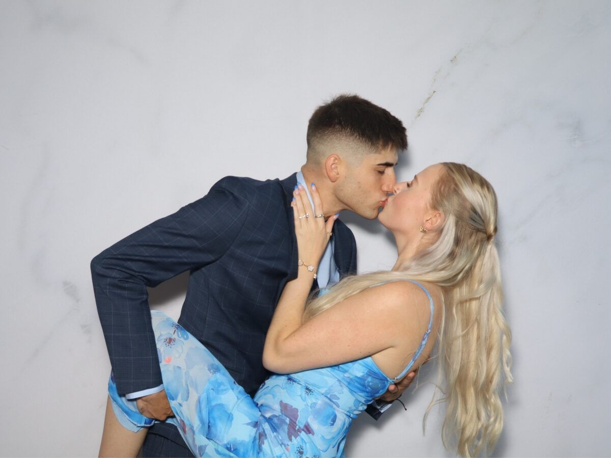 Guests laughing in the photo booth
